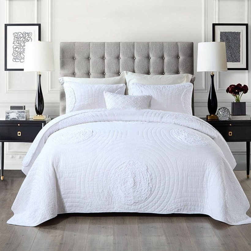 Embroidered quilted bedding