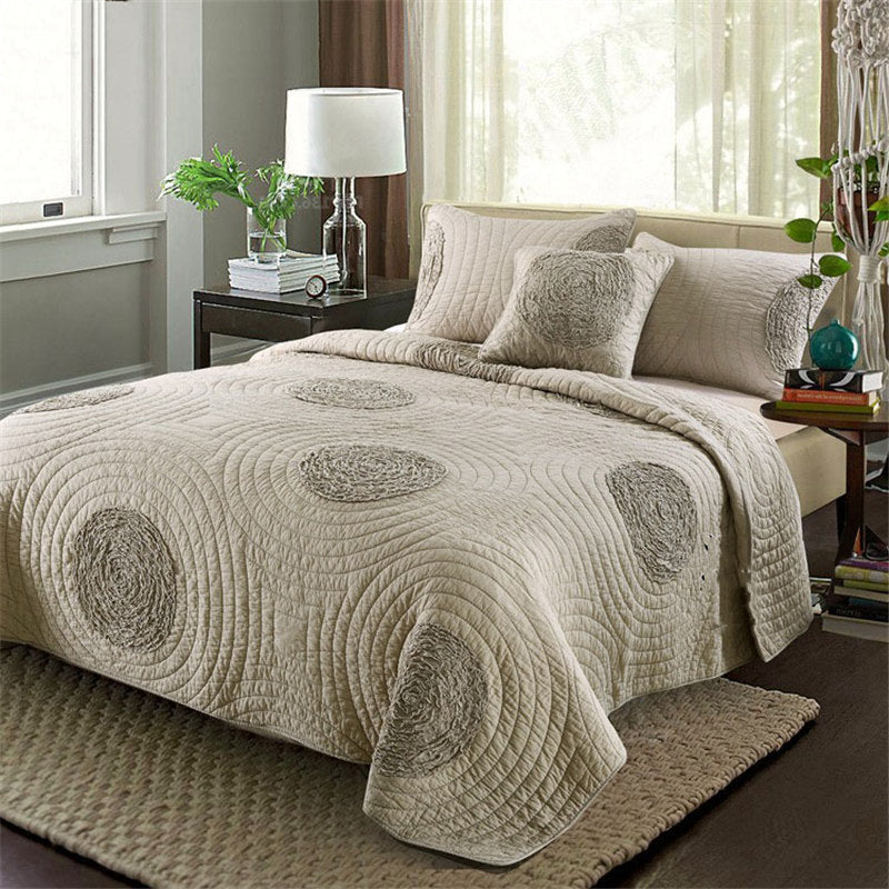 Embroidered quilted bedding