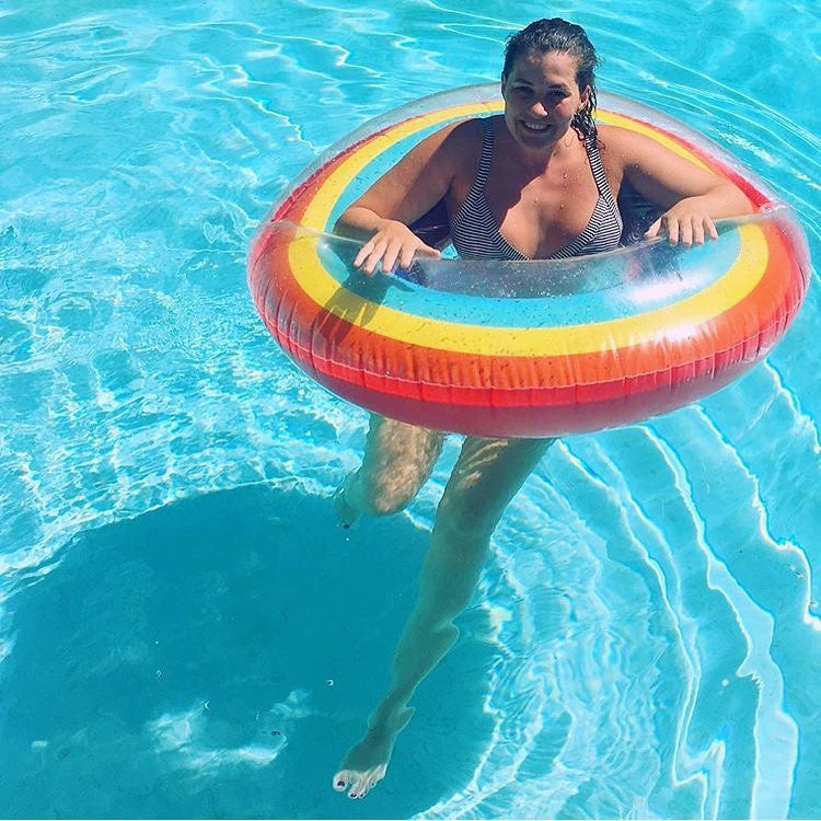 Inflatable rainbow swimming ring